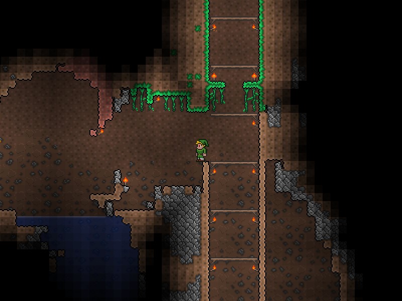 Terraria_mining_cave_to_hellevator